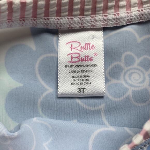RuffleButts 🌸 Flower + Seersucker Ruffle Trim Rashguard - Picture 2 of 4